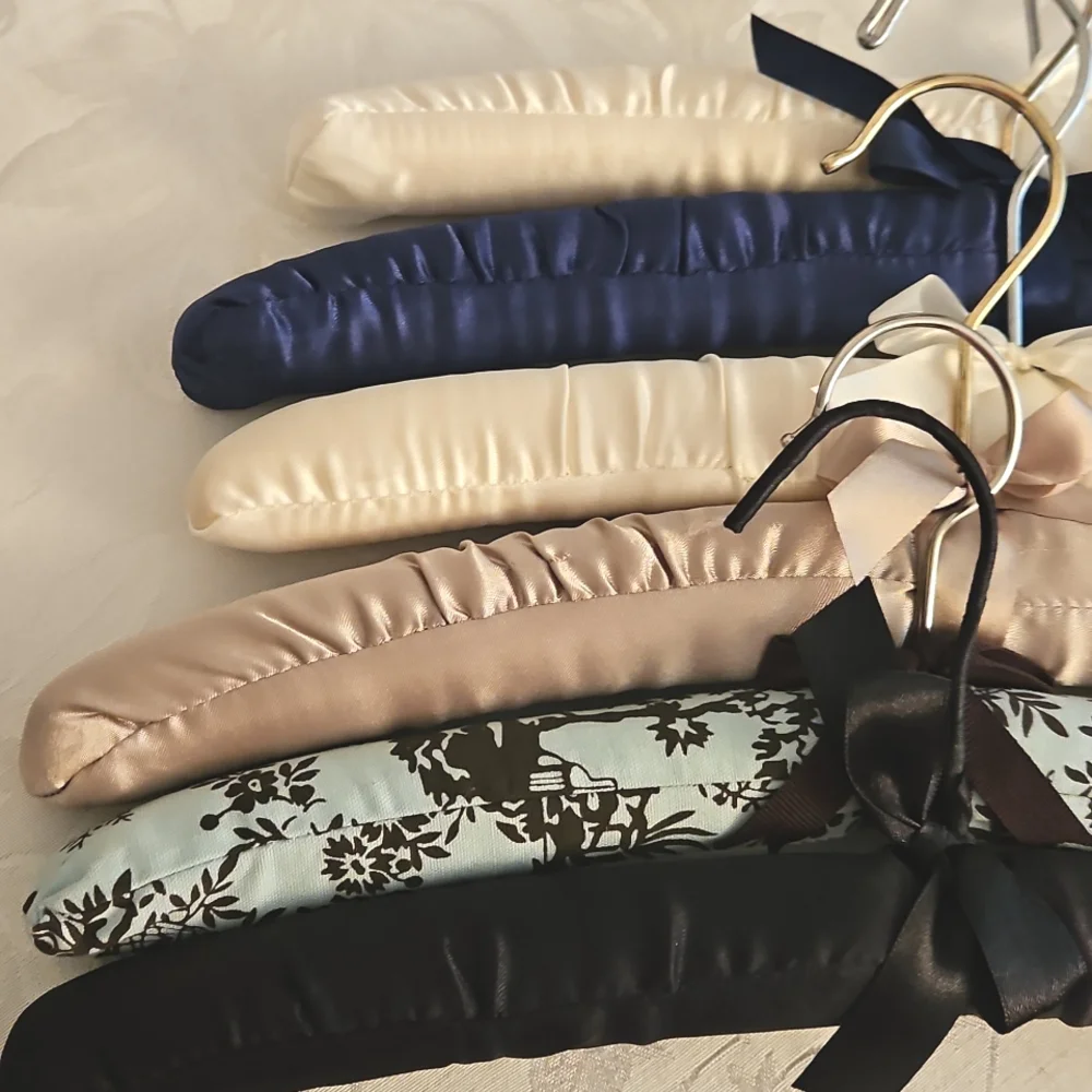 6 Satin Padded Hangers.